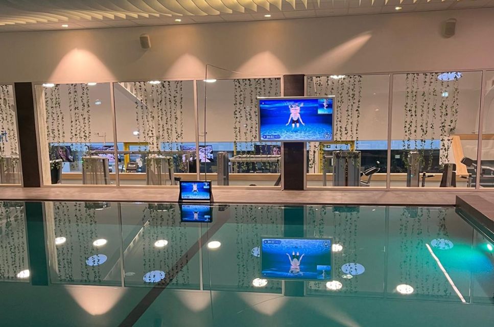 Waterbic aqua aerobics screen at the poolside of a swimming pool