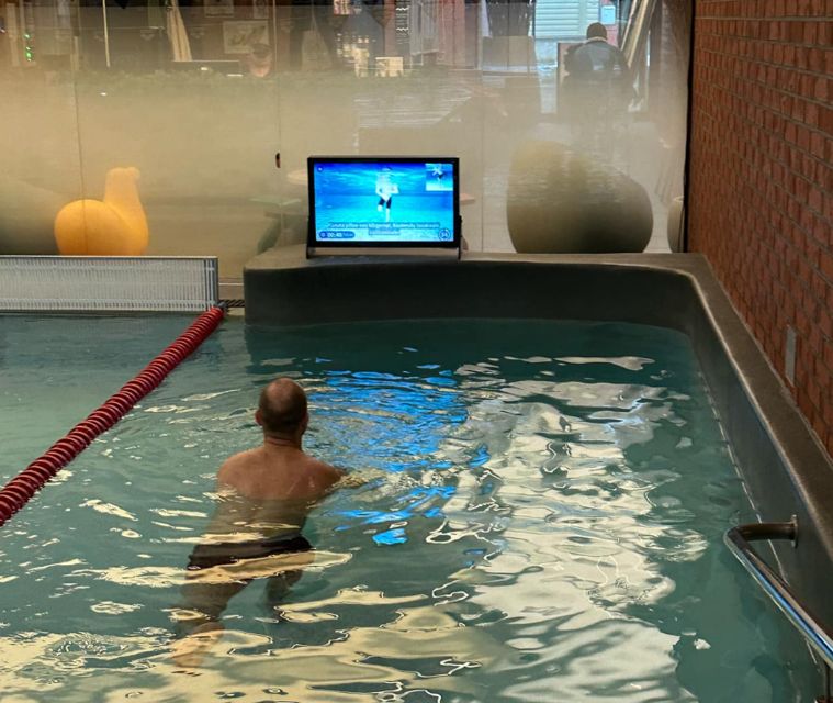 Waterbic aqua aerobics screen at the poolside of a swimming pool