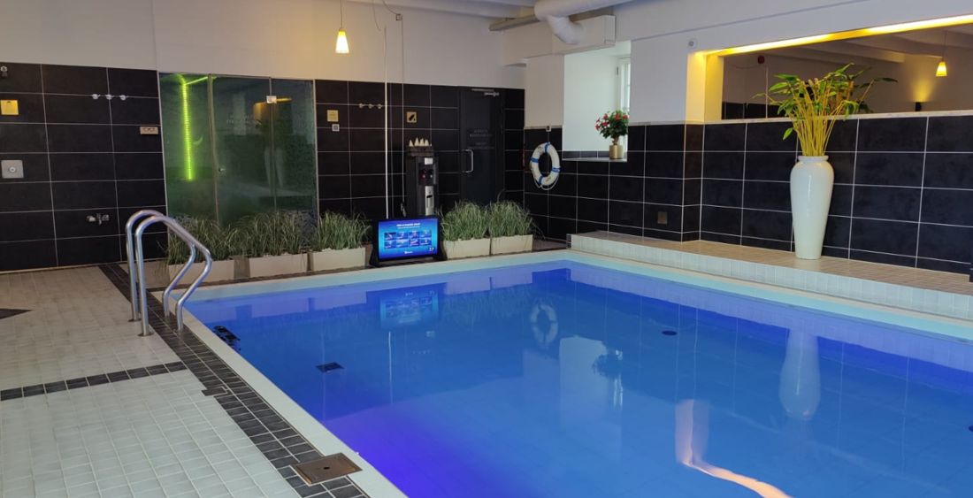 Waterbic aqua aerobics screen at the poolside of a swimming pool