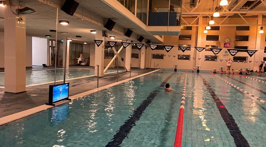 Waterbic aqua aerobics screen at the poolside of a swimming pool