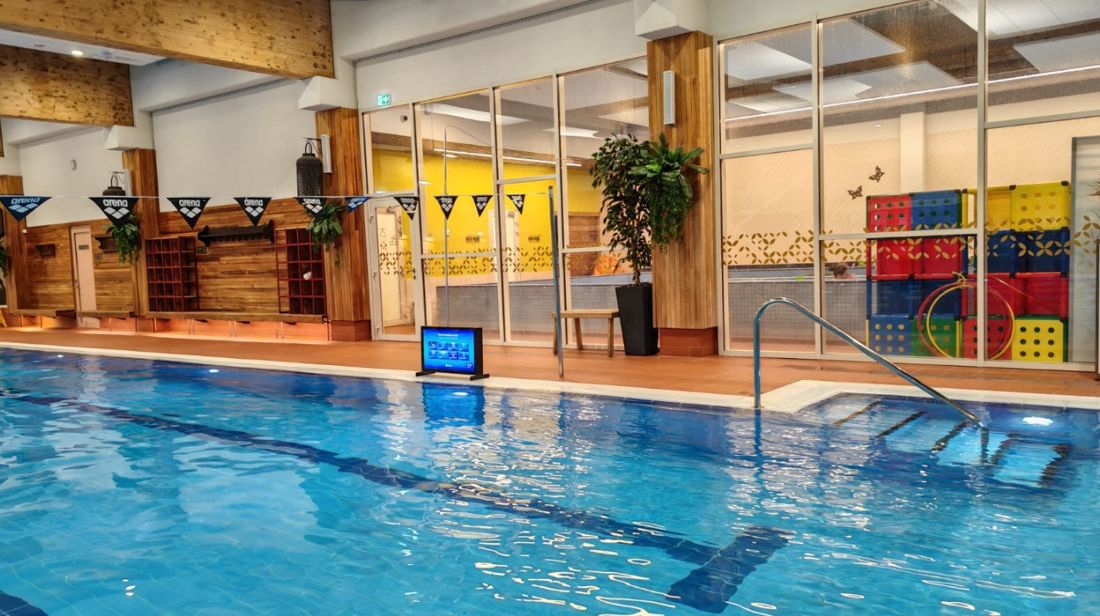 Waterbic aqua aerobics screen at the poolside of a swimming pool
