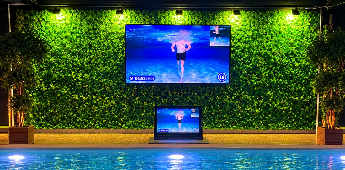 Waterbic aqua aerobics screen at the poolside of a swimming pool