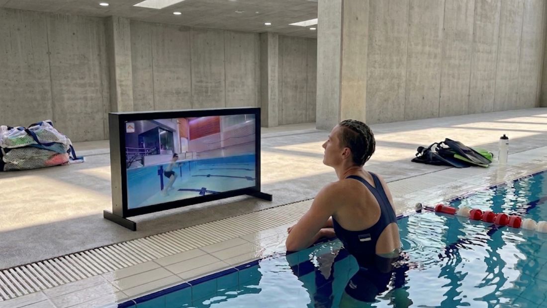 Waterbic aqua aerobics screen at the poolside of a swimming pool